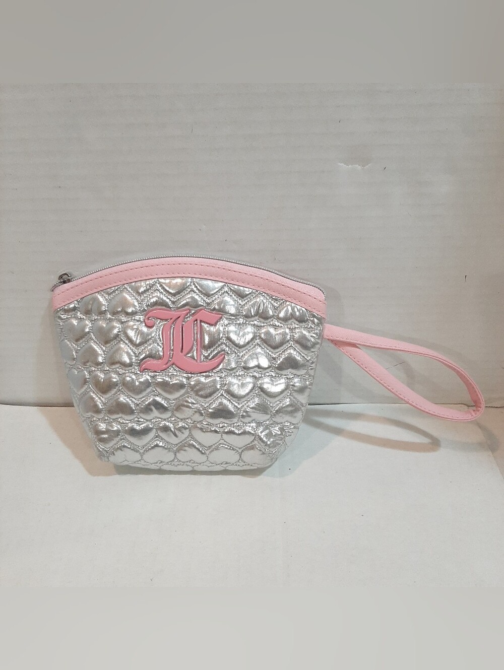 Juicy Couture silver metallic quilted heart cosmetic wristlet with pink accents